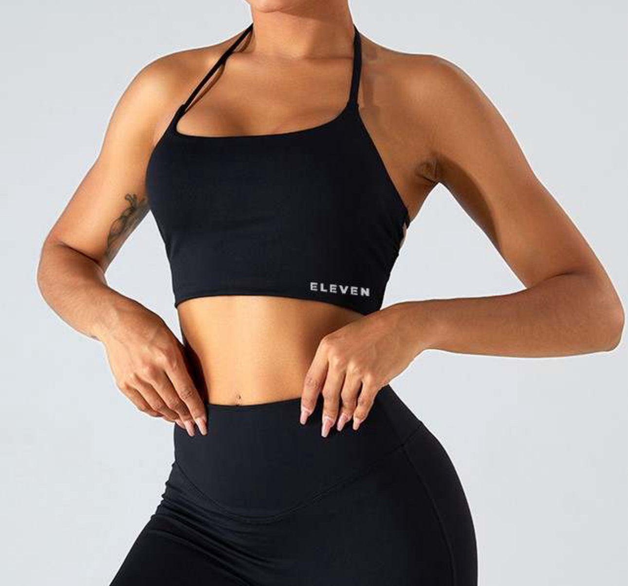 Twisted backless halter sports bra